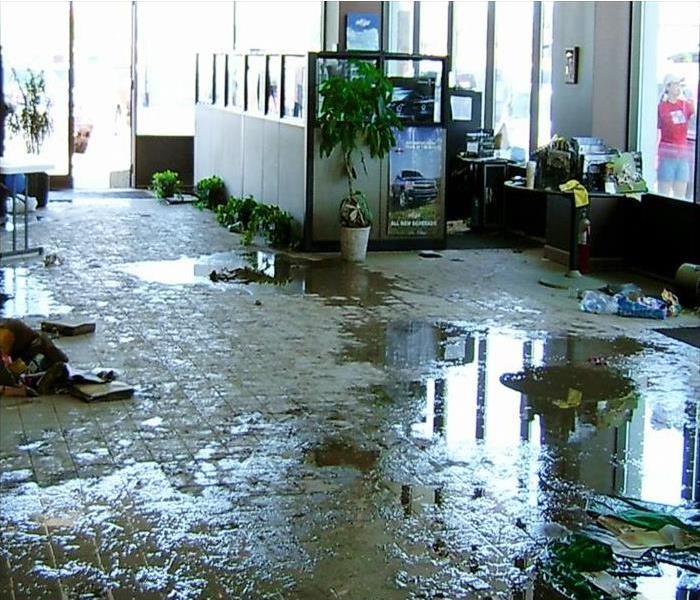 Water damage on floor and contents in a commercial property